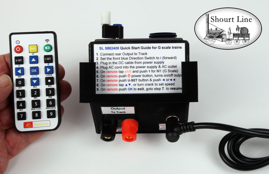 SL-DC-8-SPS-Set: Any Gauge SL 5882408 400W 50V 8.1A Max. Precision Digi Throttle w IR Remote Control + SL 5112408 Regulated PS 24V 8A AC supply w AC cord top back view of quick start guide IR Controller in hand